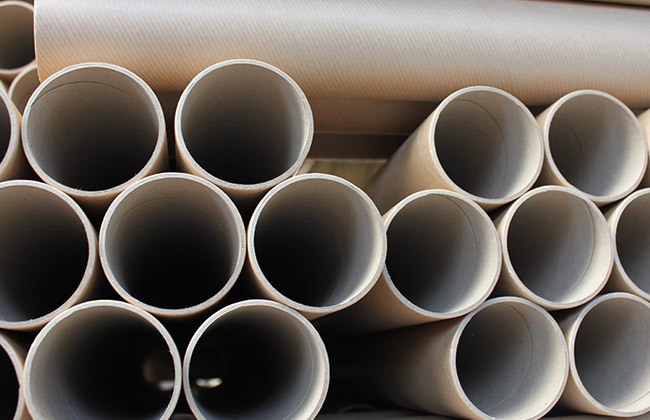 a1 postal tubes stacked on top of each other