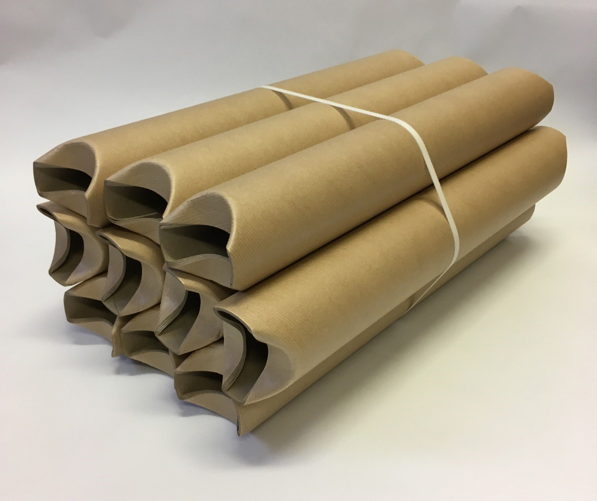 tucked ends cardboard tubes tied together